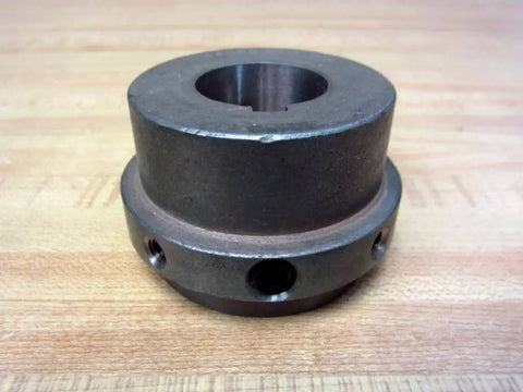 Heavy Duty 4SHSB Hub Assembly with Keyway for One and One Eighth Inch Shafts Rexnord Brand, steel, on wooden surface