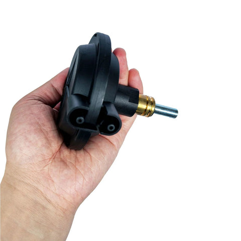 Vanlison 4WD vacuum actuator held in hand with black plastic housing, brass threaded collar, and silver shaft