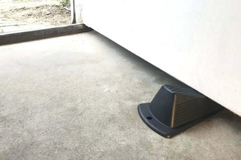 Heavy Duty Jumbo Door Wedge In Black For Home And Office Use Extra Grip Lip Non-Marking Hard Plastic With Large Footprint To Hold Rough Surfaces And Prevent Wall Damage