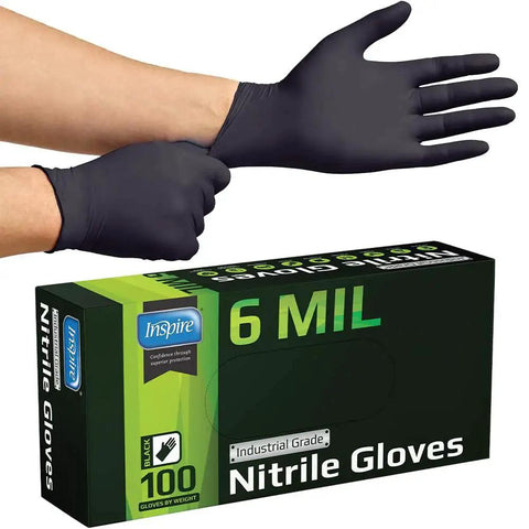 Person wearing Heavy Duty 6 Mil Black Nitrile Gloves Latex Free For Food Industry And Mechanics with box in view