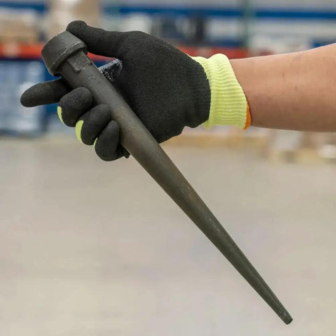 Person holding Heavy Duty Bull Pin For Alignment And Metalworking With Forged Heat Treated Broad Head 1 1/4 Inch Black Finish