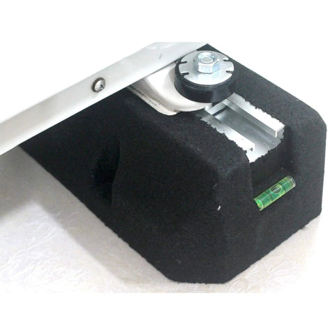 Heavy Duty Condenser Pad For Mini Split Air Conditioners And Heat Pumps Universal Outdoor Mount Ground Stand Anti Vibration Isolator Reduces Noise And Vibration Compatible With 9000 To 60000 BTU shown in angled view with level indicator