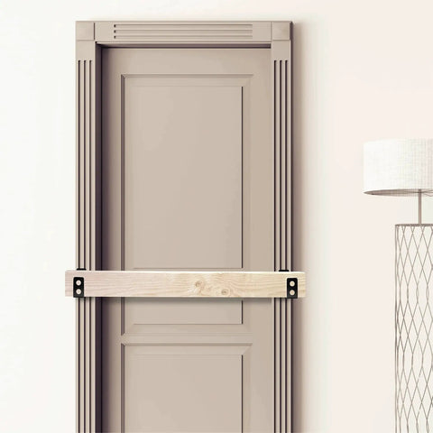 Heavy Duty 2x4 Door Barricade Brackets Set For Indoor Outdoor Use 700 Lbs Of Force Easy Install In Minutes Rust Proof Iron U Brackets 4pcs Per Pack Gate Bar Holder For Secure Home Entry And Exterior Doors installed on a wooden door showing reinforced security measures.