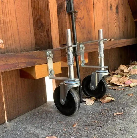 Heavy Duty Gate Caster Wheel 4 Inch With Spring Loaded Bracket Universal Mount Plate Durable Hard Rubber Tread installed on gate