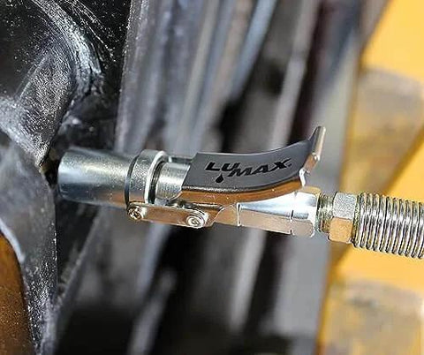 Beefy Heavy Duty Quick Release Grease Coupler 1/8 In NPT 1 Pack With Integrated Non Return Valve attached to machinery