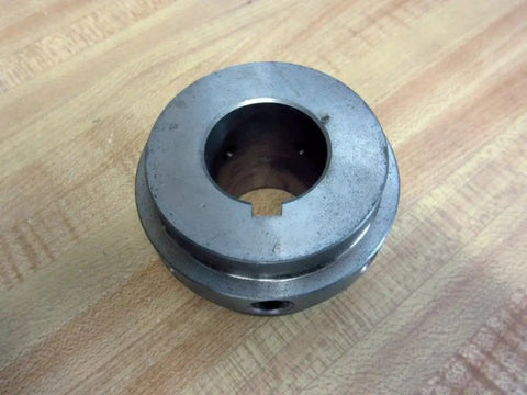 Heavy Duty 4SHSB Hub Assembly With Keyway For One And One Eighth Inch Shafts Rexnord Brand on a wooden surface