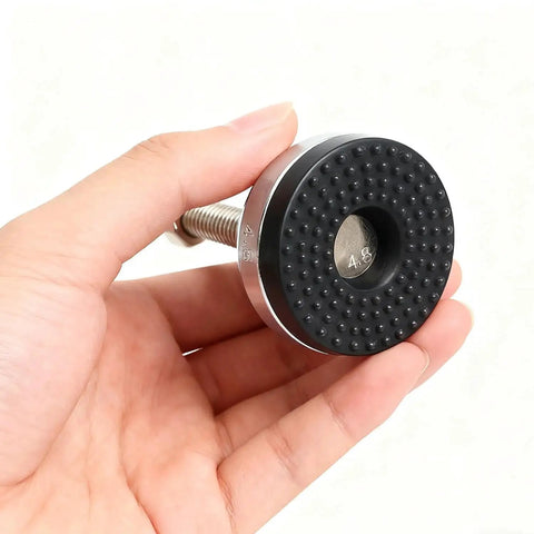 Hand holding Built Tough Heavy Duty Leveler Leg For Cabinets And Workbenches With 2.36 Inch Diameter Base, M12 Thread, PVC Coating