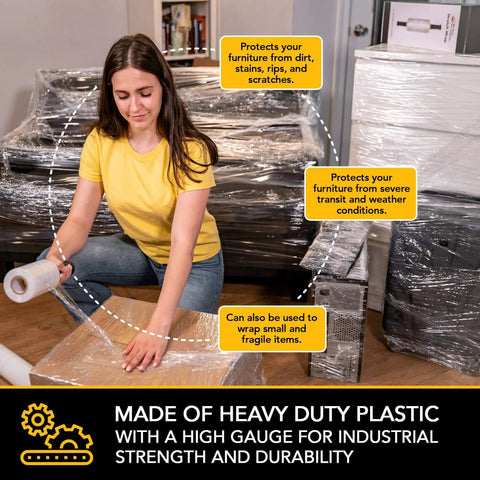 Person using Heavy Duty 15 Inch Clear Stretch Wrap Roll With Handles For Moving And Packing 1000 Feet Of Industrial Plastic Wrap 60 Gauge Strength Cling Film For Furniture Pallets Shipping And Packing Supplies on furniture.