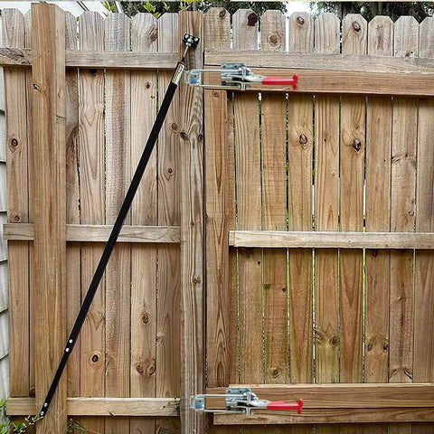 Heavy duty toggle clamp latch holds up to 2000 lbs installed on wooden gate, showcasing 4mm cold rolled steel and galvanized finish.