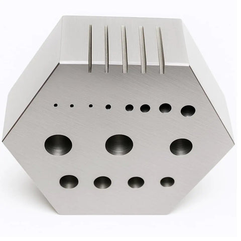 Heavy Duty Hexagonal Steel Riveting Block For Precision Riveting And Staking Bench Wizard Quality 2 Inch Across Corners With 15 Holes From 3/64 To 1/4 Inch And 5 Dedicated Wire Rivet Slots And A 7/8 Inch Thick Body.