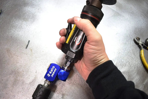 Person holding tool with High Flow 3-Way Air Swivel 3SB40 attached, showing 360 degree motion and rugged construction in use.