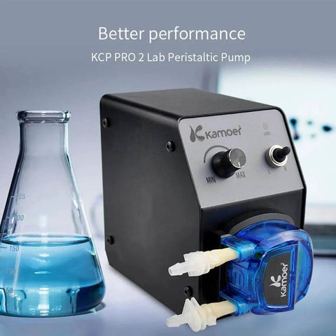 Lab setup with a 40-210ml/min high flow peristaltic pump 12V dc variable speed small dosing pump and Norprene tube, next to a beaker.