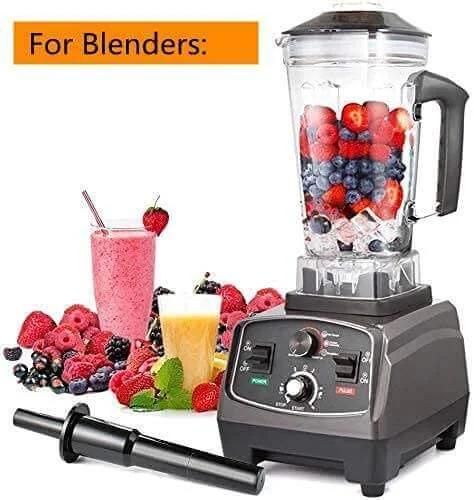High-powered blender with fruit smoothies and cup with berries.