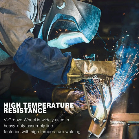 Welder operating near 4 Inch By One And A Half Inch Cast Iron V Groove Wheel With Roller Bearing 600 Lbs Capacity Designed For Heavy Duty Roll Tracks And Sliding Gates Industrial Metal Casters For Rolling Applications Durable Black 1 Pack.