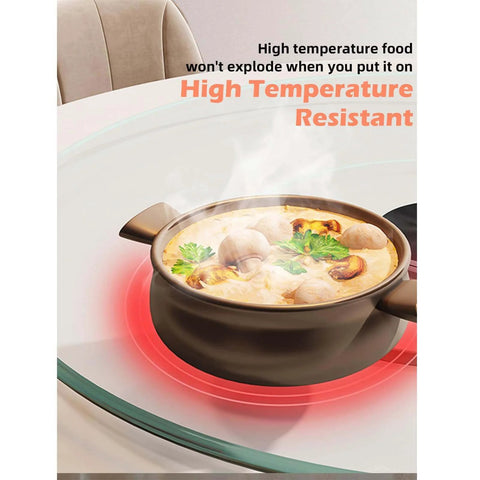 22.8 inch tempered glass lazy susan rotating serving tray with a hot food bowl demonstrating high temperature resistance.