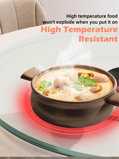 26.7 inch tempered glass lazy susan rotating serving tray showing a steaming pot on a high temperature resistant surface.