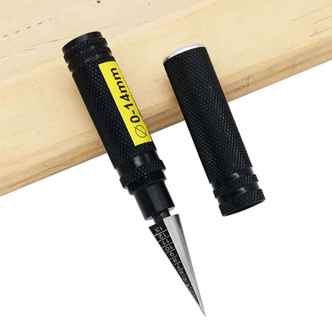 0 To 14mm Model Hole Puncher And Reamer Tool with protective sleeve on wooden board
