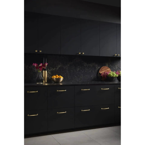 Modern kitchen with Barrow 7-9/16 Inch Center To Center Cabinet Pull TK1054HB Honey Bronze Finish on black cabinets.