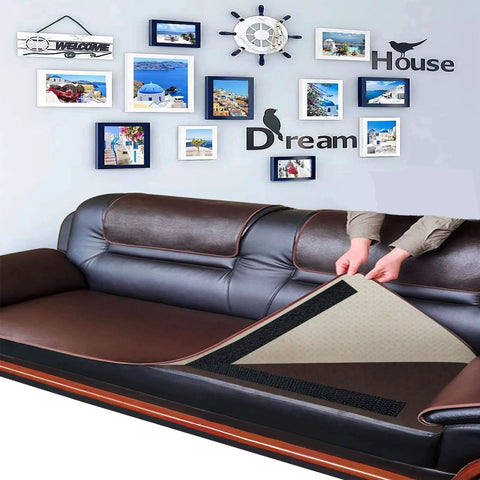 Person applying Two Inch Wide Hook And Loop Tape Set With Self Adhesive Backing in Black Nylon on couch cushions.
