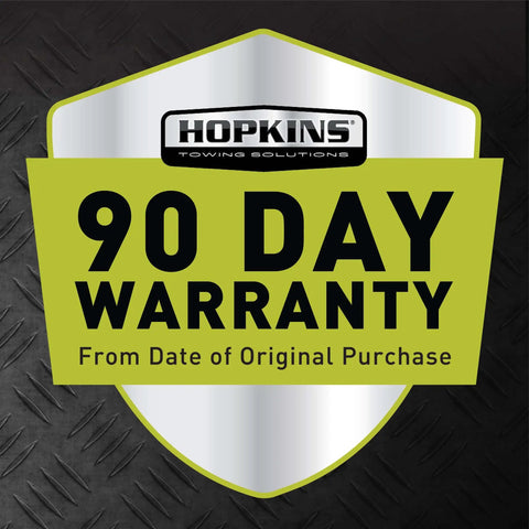 Hopkins Towing Solutions 90 Day Warranty shield displayed on black diamond plate background