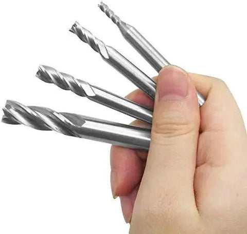 Hand holding 10 Piece 4 Flute End Mill Set In Metric Sizes From 2mm To 12mm HSS High Speed Steel For CNC Milling Cutters
