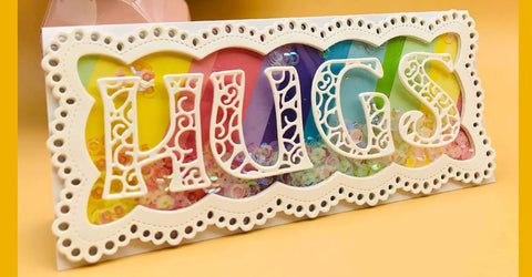 Decorative card with "HUGS" crafted from 26 Piece Alphabet Letter Metal Cutting Dies For Scrapbooking Card Making And Paper Crafts Dope Die Cuts Vintage 5 cm Height High Quality Steel Die Cut Set From Alinacutle.