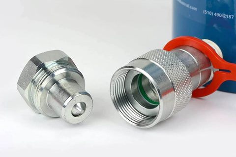Close-up of hydraulic cylinder fittings for Hollow Hydraulic Cylinder Ram 20 TON 4 Inch Stroke, silver connectors on white background.