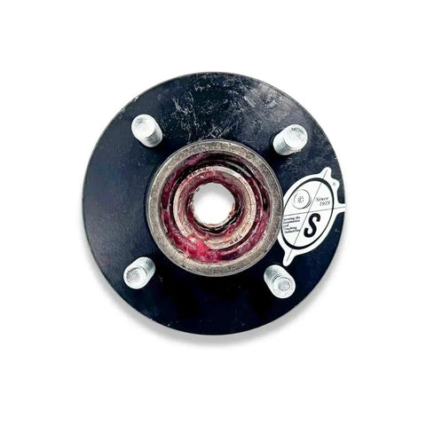 Top view of a pre-greased 4-hole 4-inch bolt circle idler hub for 2000 lb trailer axles, featuring L44649 bearings and lug nuts.