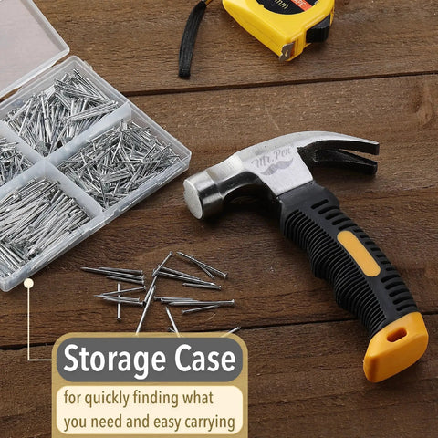 Bulk picture hanging kit with 600 galvanized nails in four sizes plus an 8 ounce hammer on a wooden surface with storage case
