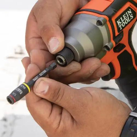 Three In One Flip Socket For Impact Drivers With One Quarter Inch Quick Connect And Five Sixteenth Inch Hex Drivers Deep And Shallow Positions SAE Socket And Bit Holder Rare Earth Magnet Three Inch Length Impact Rated being installed into an impact driver.