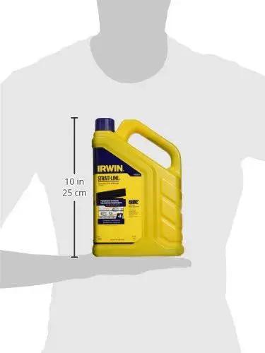 Person holding a 4 lb bottle of Indigo Blue Permanent Staining Marking Chalk with flip cap for outdoor field layouts.
