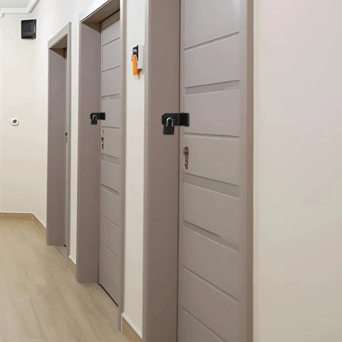 Hallway with doors secured by 4 Inch 90 Degree Stainless Steel Padlock Hasps With Padlock And Keys Set, right angle door latch for security.
