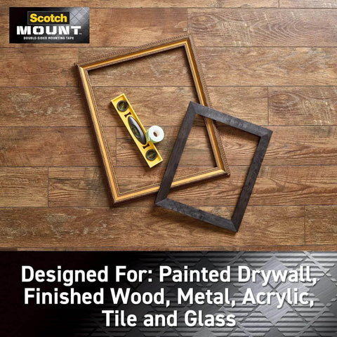 Indoor Double Sided Mounting Tape Mega Roll 3/4 Inch By 350 Inches Heavy Duty Adhesive for Painted Drywall with picture frames on wood floor.