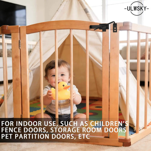 Sliding Door Latch With Hook Black Cam Latch used on a wooden pet partition door for safety in home interior