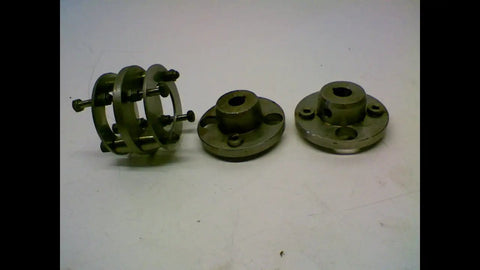 Cma Dbz 50 Td Coupling For Industrial Machinery New By Rexnord Lightweight 1.42 Lb 4 By 4 By 4 Inches Square Footprint Built To Last High Precision Drive Connection Ready To Install showing components disassembled
