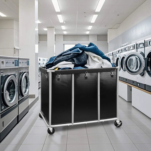 Industrial Laundry Cart On Wheels With 420L Capacity in a commercial laundromat, loaded with linens, showing heavy duty steel frame and wheels.