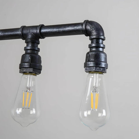 Close-up of Rustic Industrial Tube Pipe Chandelier With Five Light Edison Style Steampunk Pendant Light Fixture details
