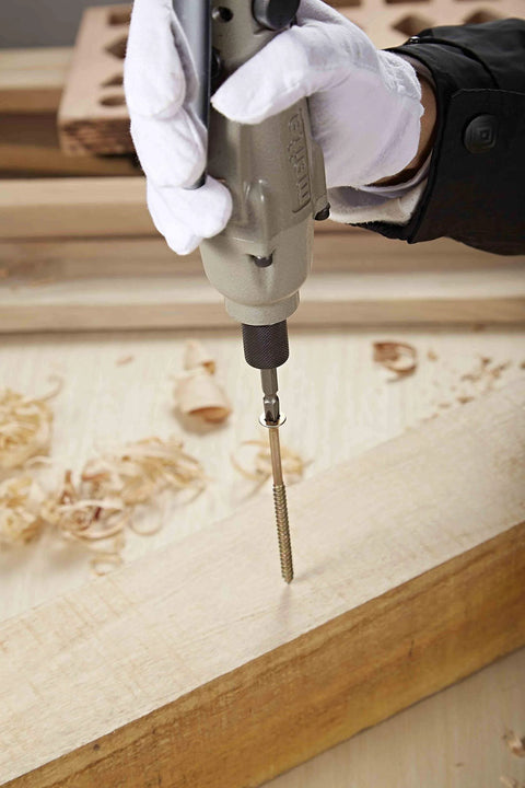 Person using MT-1205S 1/4-Inch Industrial Air Torgue Pneumatic Screwdriver with 9500 RPM Speed on wooden surface