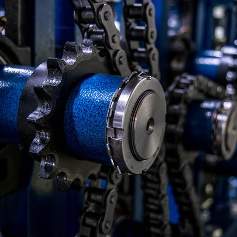 Close-up of No 40 Chain Roller Sprocket B Type for single strand chains, 18 teeth carbon steel with keyway and set screws, installed.