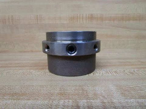 Front view of Industrial Shaft Coupling Rexnord 7300285 Straight Bore Hub with 1-1/8 in bore, showing surface rust.