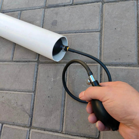 Inflatable Pipe Plug Balloon For Plumbing Tests And Pipe Sealing in white PVC pipe, hand inflating for 1.7 to 4.1 inch diameters