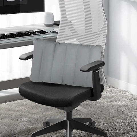Inflatable seat cushion on office chair, compact, gray PVC material, for travel and comfort
