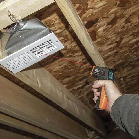Infrared Thermometer, Digital Laser Gun is Non-Contact Thermometer measuring air vent temperature on a ceiling with laser targeting.