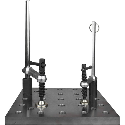 Inserta Clamp For BuildPro Tabletop With Six And A Half Inch Clamp Capacity, shown on a metal riser block with holes.
