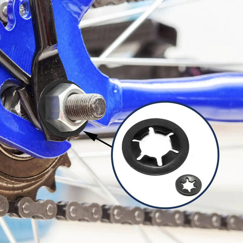 Internal Tooth Star Lock Washers Kit M2.5 To M12 Push Nuts 500 Pcs, installed on bike gear mechanism, showing detailed washer design.