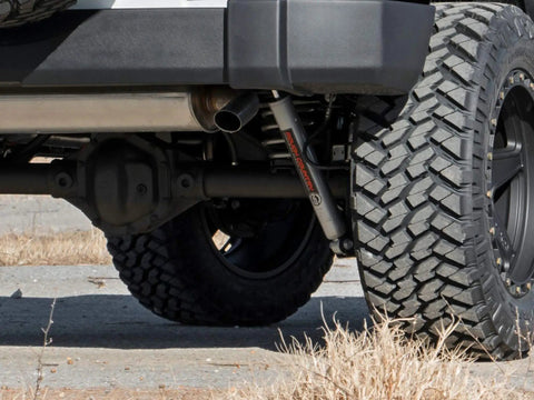 Installed Front Shocks For Jeep Wrangler TJ And Cherokee XJ 5-6.5 Inch Travel N3 With 10-Stage Variable Valving, rear view close-up.