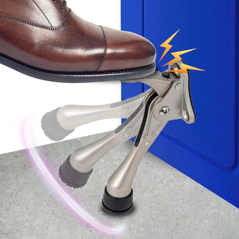 Foot activating One Touch Kickdown Door Stopper, satin nickel finish with height-adjustable rubber tips by HASHI, keeping door open.