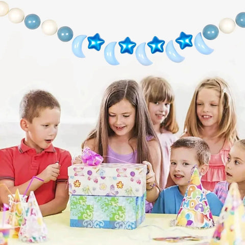 Children opening gifts with Ball Pit Balls Stars Moon Shapes Plastic Pitballs for Toddler Play Decor, Pearl Blue+Cream Blue+White,100PCS.