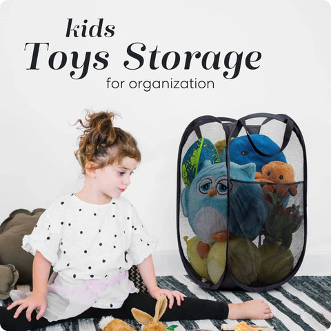 Collapsible Mesh Pop Up Hamper With Wide Opening And Side Pocket Breathable Sturdy Foldable Space Saving Design For Clothes And Home Storage Black Ideal For Apartments Dorm Rooms Travel Laundry with kids' toys inside next to a child.