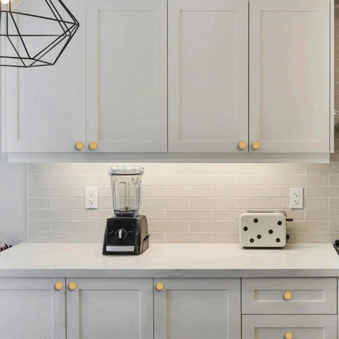 Champagne Bronze Zinc Alloy Knurled Dresser Knobs 20 Pack Cabinet Hardware For Cabinets And Drawers installed on white kitchen cabinets